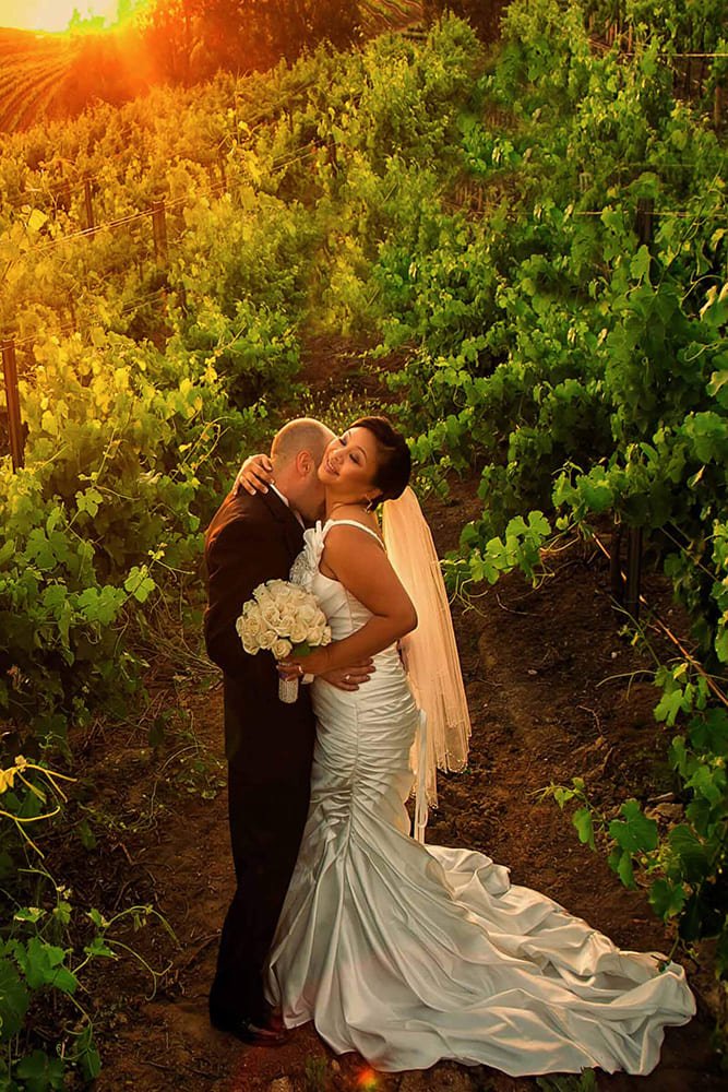 Wedding photography Los Angeles Image369 — Couple in vineyard at golden hour